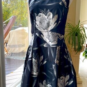 Cocktail dress by Carmen Mark Volvo, size 12. Black and silver in color.